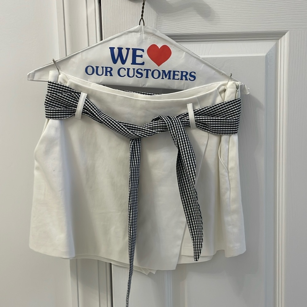 White envelope skort
